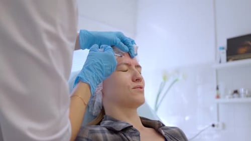 Cosmetic Injections for Forehead Wrinkles in Clinic