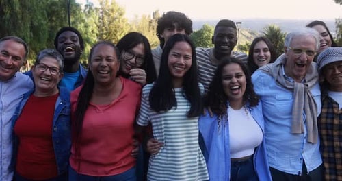 Diverse Group of People Smiling Together Outdoors