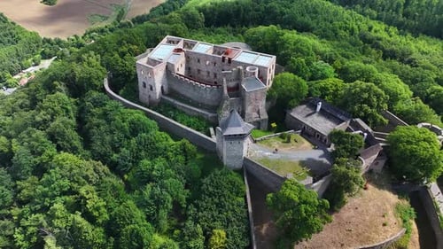 Aerial view of Helfstyn Castle on hill in Moravia, Czech Republic. Tourist attraction, history.