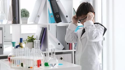 Young Boy Scientist Preparing Science Experiment