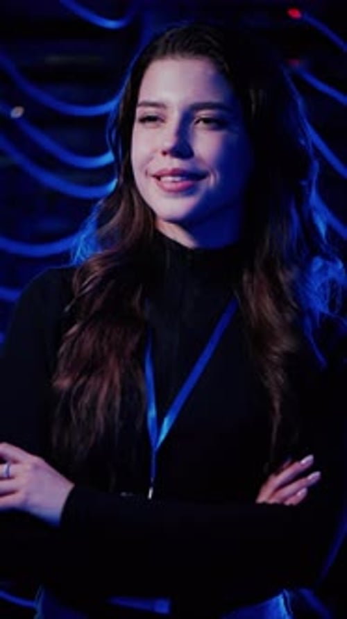 Young Adult Woman Standing in Data Center