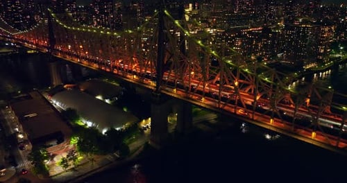 Gorgeous lighting of Queensboro Bridge at night. Stunning city scenery of New York