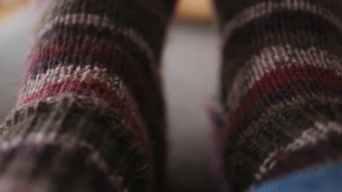 Close Up Shot of Feet in Striped Socks