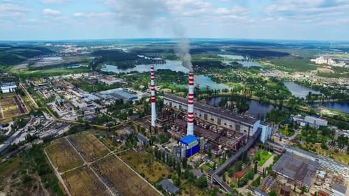 Industrial Factory with Smokestacks at Sunny Day. Aerial View Heavy Industry Zone
