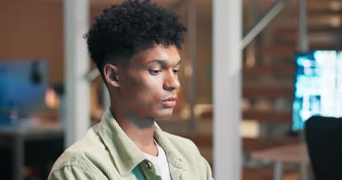 Man, coding or working on video game in office or writing a futuristic software in information