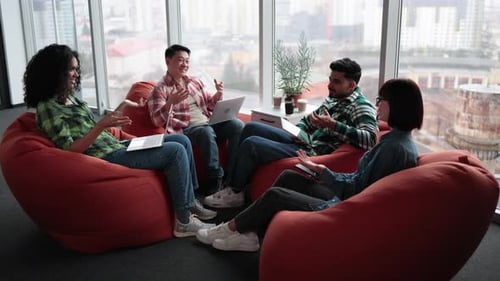 Business Team Meeting in Modern Urban Office