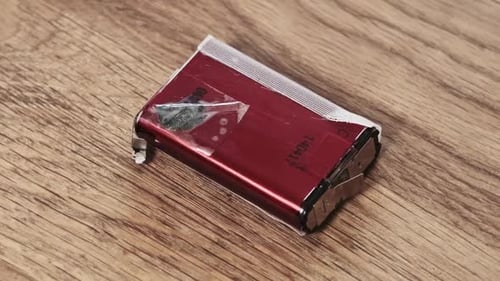 Close Up of Packaged Red Electronic Battery