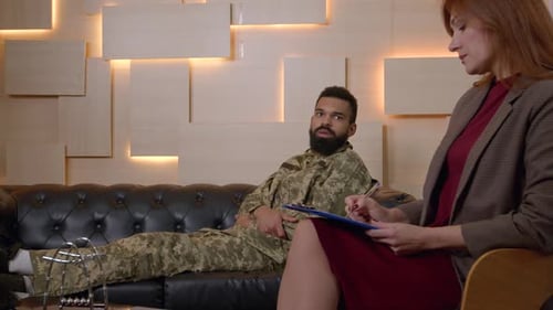 Soldier talks to therapist, healthcare and mental health
