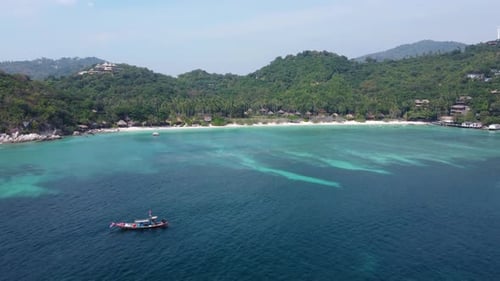 The shallow, turquoise waters of Shark Bay, Ko Tao, Thailand. Aerial