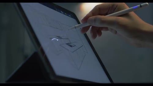 Hand Drawing Architectural Design on Tablet with Stylus