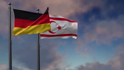 Waving Flags of Germany and Northern Cyprus Against Cloudy Sky