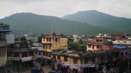 Tilt shot of a busy day in the streets of Hetuada in Nepal on a cloudy day