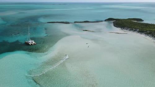 KiteSurfing or KiteBoarding on Tropical Ocean Bahama Waters, Aerial Drone