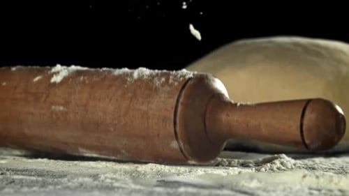 A Rolling Pin Falls on the Kitchen Table Filmed on a Highspeed Camera at 1000 Fps