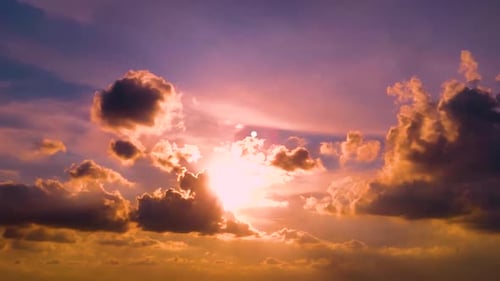 Clouds Pass By While Sun Sets