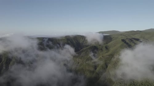 Mountain top with clouds