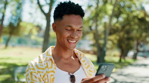 Online, man and laughing with phone at park for social media meme, funny internet news