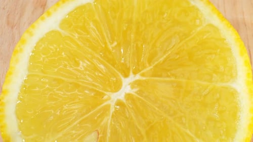 Bright Close Up of a Refreshing Lemon Slice