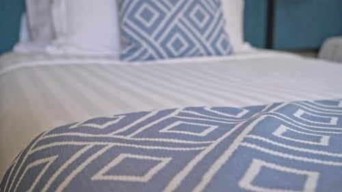 beautiful pillow on bed decoration in bedroom interior