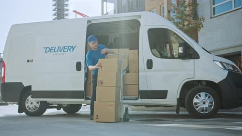 Courier Opens Delivery Van Side Door and Takes out Cardboard Box Package, Closes the Door and Goes