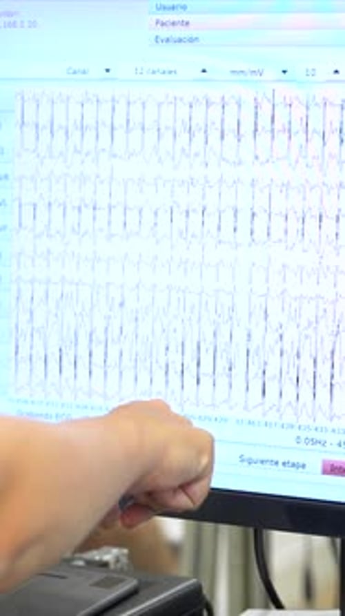 Data on the computer while man performing a stress test