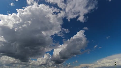 Billowing White Clouds Against a Deep Blue Sky
