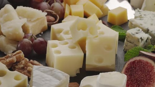 Cheese Selection with Nuts and Fruit Close Up