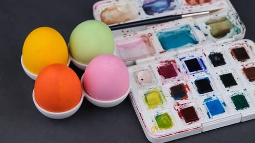 Colorful Painted Easter Eggs with Watercolor Palette