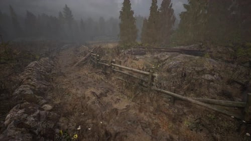 An Old Wood Fence with a Country Field Behind It