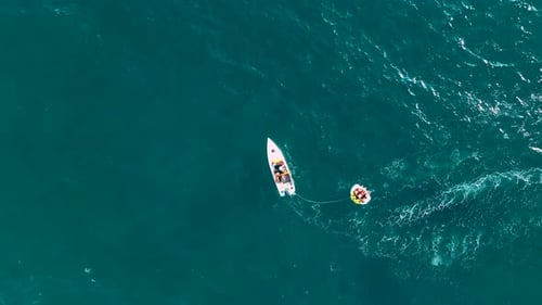 Sports Boat Sails Fast on the Sea Aerial View 4 K