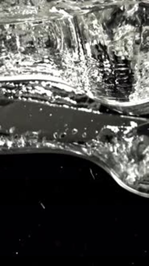 Cutlery Falls Under Water Filmed on a Highspeed Camera at 1000 Fps