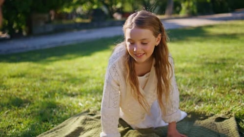 Mother and Daughter Enjoy Sunny Day in Park