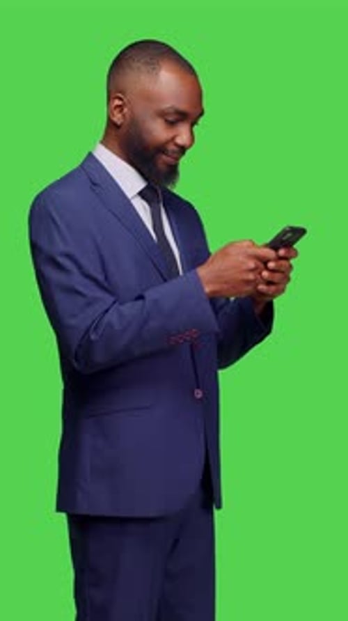 Vertical Video Side View of African American Man Texting Messages Browsing App