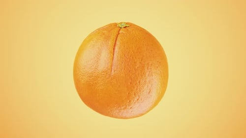 Fresh orange rotates on a white background.