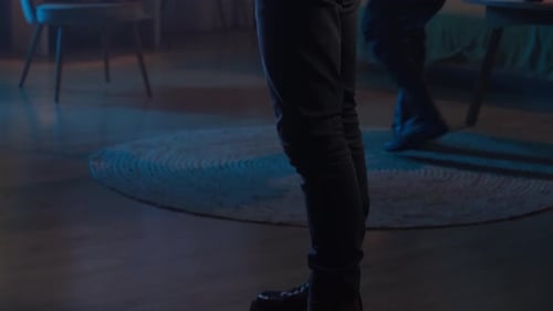 Intruders with Flashlights Enter a Darkened Home