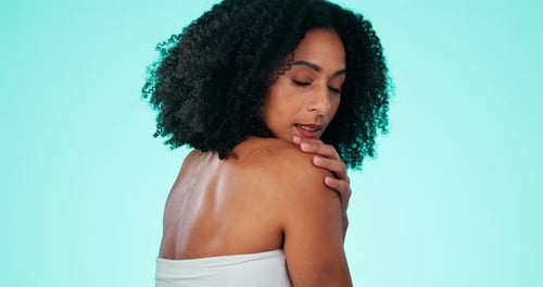 Skincare, shoulder and face of a black woman with beauty, wellness and spa aesthetic