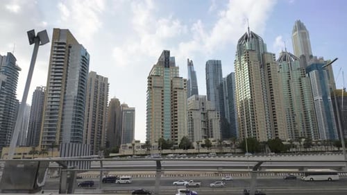 Dubai Highway and Skyscraper in Summer Bright Day Panoramic View