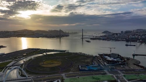 The sunlight shines down on the beach near Busan Port