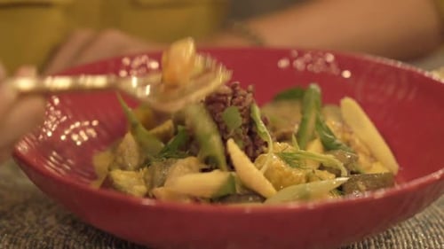 Woman Eating Salad Sitting in Cafe 30s