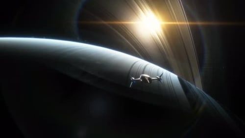 Futuristic Spaceship Flying Around a Ringed Planet