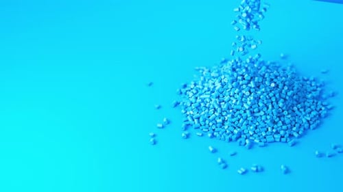 Blue Plastic Polypropylene Granules Pouring From Cup on a Pile of Granules Masterbatch Polymer Grain