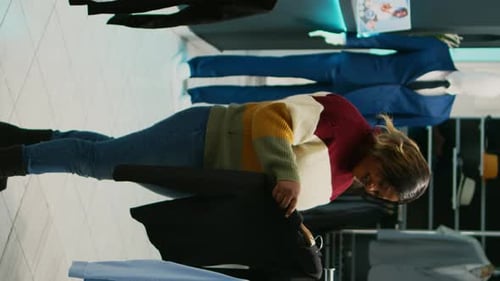 Vertical Video Diverse Women Talking About Fashion Brands in Retail Shop