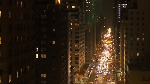A Breathtaking City Nightscape Showcasing Illuminated Streets Along with Majestic Buildings