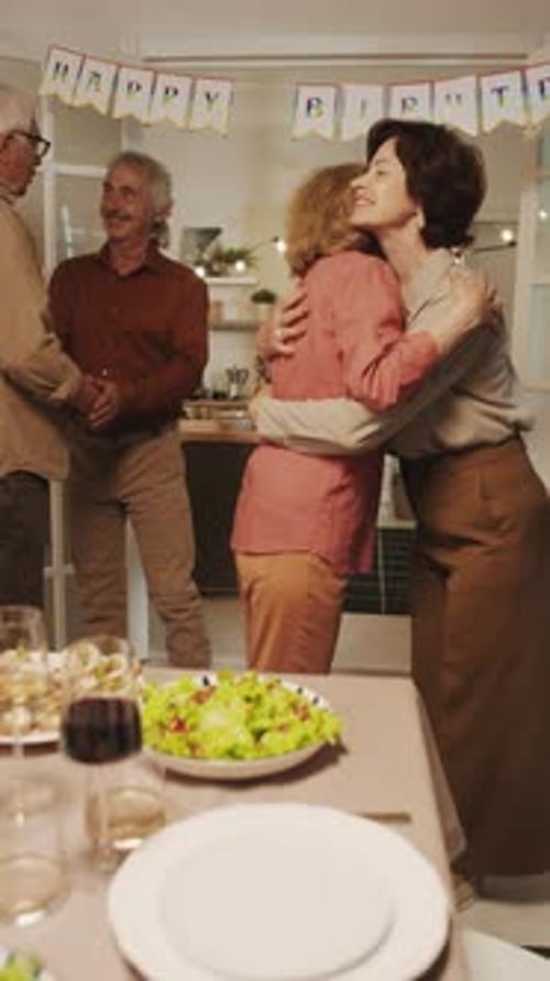 Family Celebrates Birthday with Hugs and Warmth