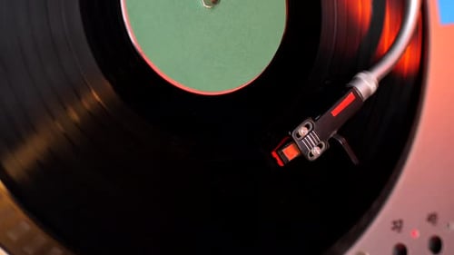 Spinning Vinyl Record on a Turntable Close Up