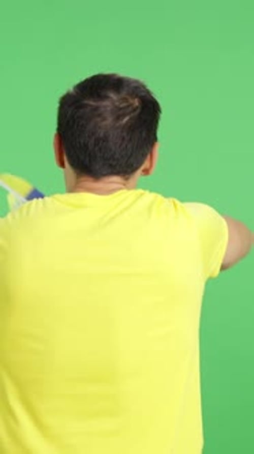 Rear View of a Man Waving a Ecuadorian Pennant