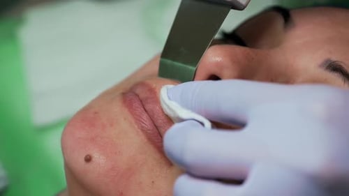 Facial Treatment with Ultrasonic Skin Scrubber Close-Up
