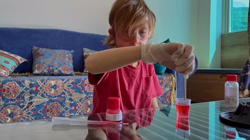 Child Performing Science Experiment at Home