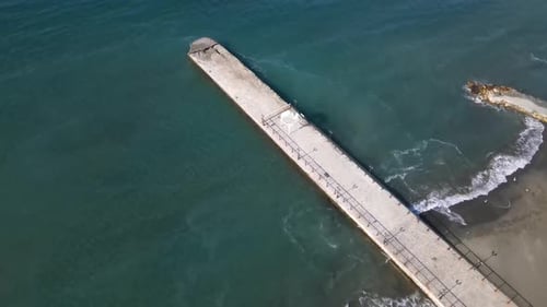 Summer sea city. Flight over the city, sea and buildings.