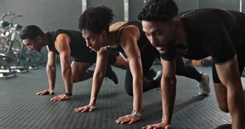 Workout, mountain climbers and athletes in gym, exercise and strong wellness for fitness class